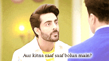 a man with a beard is talking to another man with the words aur kitna saaf saaf bolun main below him