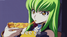 a green haired anime girl is eating a slice of pizza