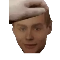 a close up of a man 's face with a beret on his head