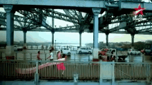 a bridge with a star plus logo in the corner