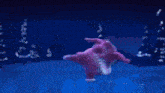 a group of pink jellyfish are floating in a blue tank