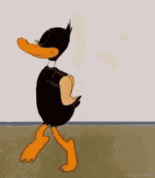Daffy Duck Strip Tease GIF - Daffy Duck Strip Tease Looney Tunes GIFs