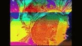 a colorful painting of a circle with a rainbow of colors on it