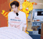 a man wearing a white t-shirt with a cartoon cat on it