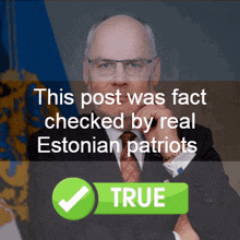 a man in a suit and tie stands in front of a check mark that says " true "