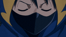 a close up of a person 's face with a black mask on