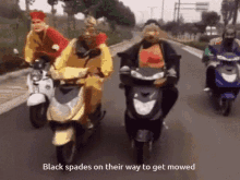 a group of people are riding scooters down a street and the caption says black spades on their way to get mowed