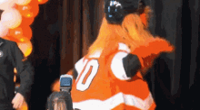 Gritty Look Around GIF - Gritty Look Around Mascot GIFs