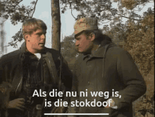 two men standing next to each other with the words als die nu ni weg is is die stokdoof