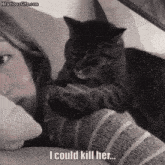 a cat is laying on a woman 's lap and says i could kill her ..