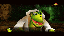 a video game screen shows a frog and a bird flying in the background