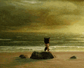 a mickey mouse is standing on a rock on the beach