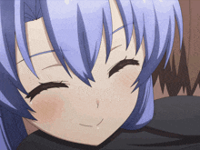 a close up of a girl 's face with blue hair
