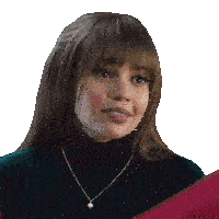 a woman wearing a black turtleneck and a necklace with a diamond on it