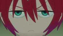 a close up of a person 's face with red hair and blue eyes