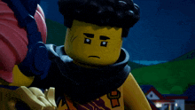 a close up of a lego character wearing headphones and a scarf