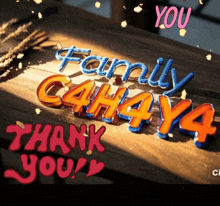 a wooden table with the words family cahaya thank you