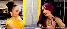 a woman with purple hair is talking to another woman in a yellow dress