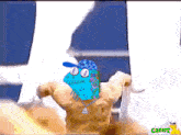 a cartoon of a man with a blue monster on his chest and the word creepz on the bottom