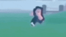a blurry picture of a person in a video game running in a field .