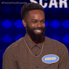 a man with a name tag that says jordan