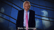a man in a suit and tie says wake up scroogee