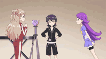 a girl with purple hair is standing next to another girl