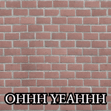 a brick wall with a hole in it and the words ohhh yeahhh on it