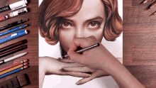 a person is drawing a woman 's face with a pen that says prismacolor on it