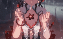 a close up of a girl holding a flower in her hands