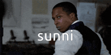 a man with the name sunni written on his chest