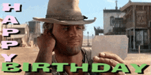 a man in a cowboy hat is holding a piece of paper with the words happy birthday behind him