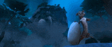 a cartoon squirrel is standing in front of an explosion in the woods