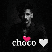 a black and white photo of a man with the word choco in white