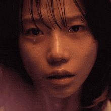 a woman with a tear coming out of her eye