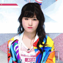 a woman with a name tag that says akb4