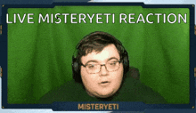 a man wearing headphones with the words live misteryeti reaction