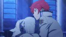 a man with red hair is hugging a woman