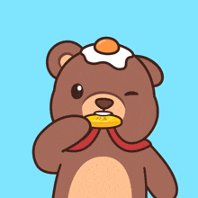 a brown teddy bear with a medal around its neck and an egg on its head