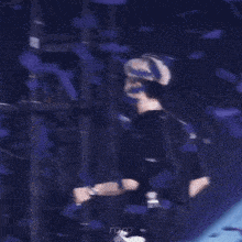 a blurry photo of a person with roro written on the bottom