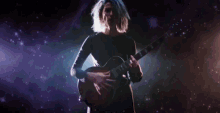 Guitar Birth In Reverse GIF - Guitar Birth In Reverse St Vincent GIFs