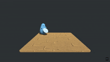 a blue ghost is standing on a wooden surface with a coin in the background