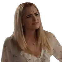a woman with blonde hair and a necklace is making a face