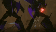 two transformers are fighting each other with sparks coming out of their mouths