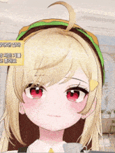 a close up of a girl 's face with a hamburger on her head