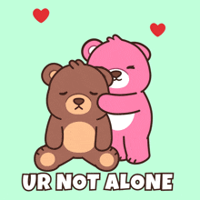 a brown teddy bear sitting next to a pink teddy bear with the words ur not alone above them