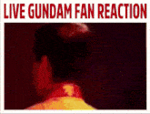 a blurred image of a person with the words live gundam fan reaction above them
