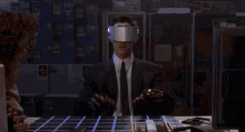 johnny mnemonic keanu reeves making a call what are you doing long distance