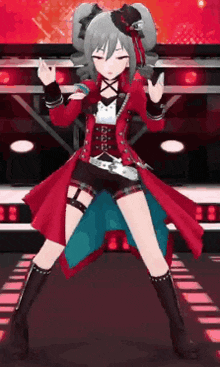 a girl in a red coat and black shorts is dancing on a stage