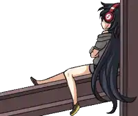 a girl wearing headphones sitting on a railing